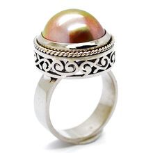 Mabé pearl ring in sterling  silver with cut-out detail on side profile of setting