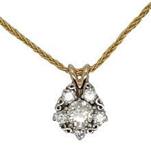 Platinum diamond pendant set with centre diamond 0,80L VS1 surrounded by 5 = 0,37ct IJ.9ct yellow split V link.
