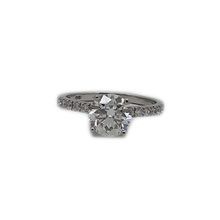 Platinum ring set with centre brilliant cut diamond weighing 2,01ct I VS2 and twelve 0,02ct diamonds down the band 
vv3