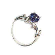 Uncommon and exquisite 18ct white gold tanzanite engagement ring