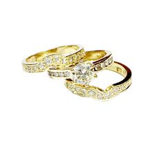18ct yellow gold diamond engagement ring  and wedding bands