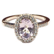 Halo style oval morganite ring with diamonds in 9ct rose gold 