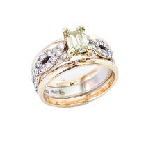 Platinum and 18ct yellow gold engagement ring set with yellow diamond and small white diamonds with 18ct yellow gold wedding bands