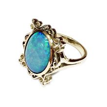 Filigree dress ring with large opal in 9ct yellow gold