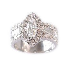 Magnificent Marquise cut and brilliant cut diamond ring in Platinum
