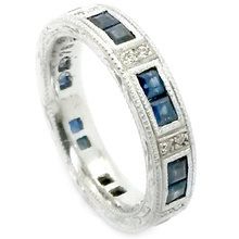 18ct white gold eternity ring set with sapphires and diamonds