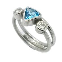 Blue topaz and diamond ring