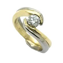 Yellow and white gold diamond engagement ring