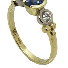 18ct yellow and white gold ring, set with sapphires and diamonds