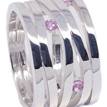 Argentinum silver stack style ring set with  four pink sapphires weighing 0,20ct in total