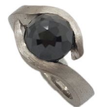 Unique engagement ring featuring black checkerboard diamond weiging 2 24ct