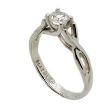 Elegant platinum engagement ring set with a single diamond weighing 0,41 H SI3.