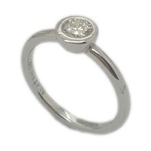 Simple platinum engagement ring set with single diamond weighing 0,45I  SI2.