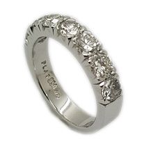 Platinum eternity style wedding bands set with seven diamonds weighing 1,80ct in total IJ. SI 