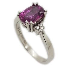 Platinum dress ring set with Oval shaped pink sapphire weighing 1,71ct, and 6 brilliant cut diamonds weighing 0,06ct in total