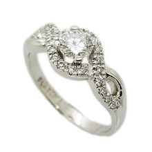 Platinum engagement ring set with centre diamond 0,473 I VS2,and 22 × 0,01ct diamonds in the band.