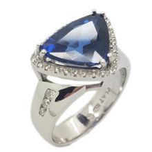 Dazzling platinum dress ring set with unique Kite cut triangular blue sapphire  and brilliant cut diamonds