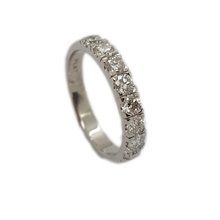 Classic platinum eternity style wedding band set with 8 diamonds in micro claws weighing 0,86ct in total GH VSSI 