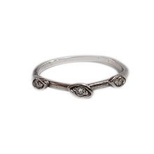 simple 9ct white gold band set with three 0,01ct brilliant cut diamonds I-J SI