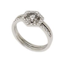 Unconventional engagement ring  set with centre Salt & Pepper diamond together with  unique designed wedding band allowing the option to wear this ring with or without the halo surrounding the main stone.