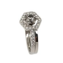 Unconventional engagement ring  set with centre Salt & Pepper diamond together with  unique designed wedding band allowing the option to wear this ring with or without the halo surrounding the main stone.